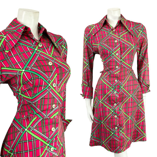 Mannequin wears a pink white and green 60s 70s long sleeve geometric grid print shirt dress. 