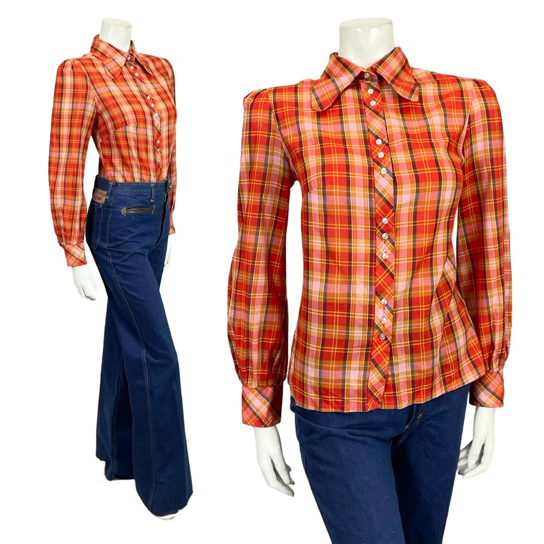 Mannequin wears a 60s 70s red and yellow plaid dog ear collar shirt with blue flared jeans.