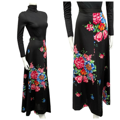 Mannequin wears a 70s black and pink floral maxi skirt with a black turtleneck