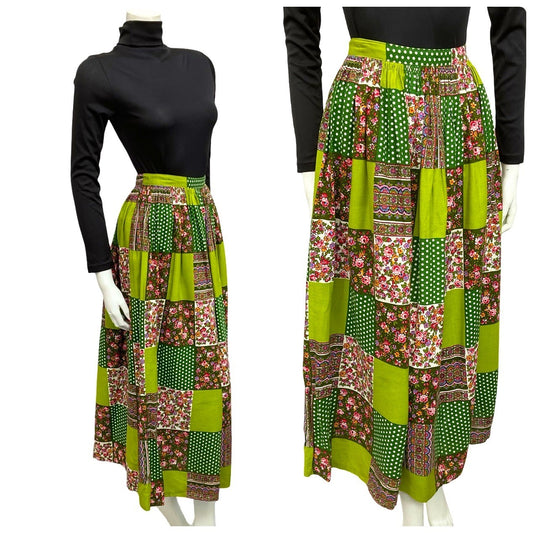 Mannequin wears a 60s 70s green floral patchwork maxi skirt with a black turtleneck
