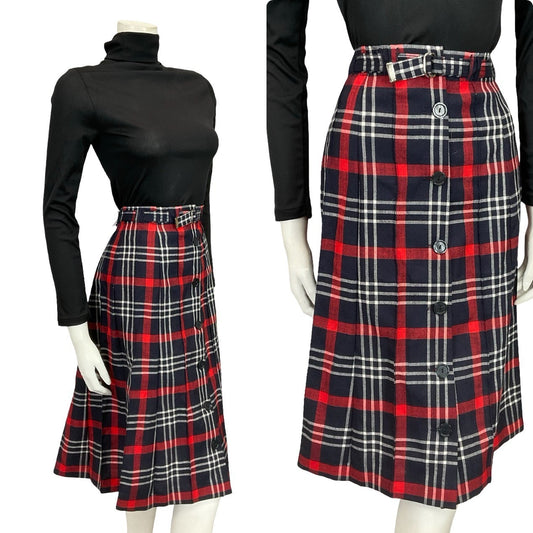 Mannequin wears a 60s 70s blue red and white tartan midi skirt with a black turtleneck