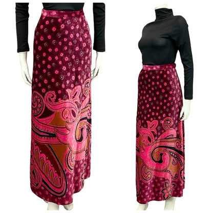 Mannequin wears a 70s pink and plum psychedelic paisley print velvet maxi skirt with a black turtleneck
