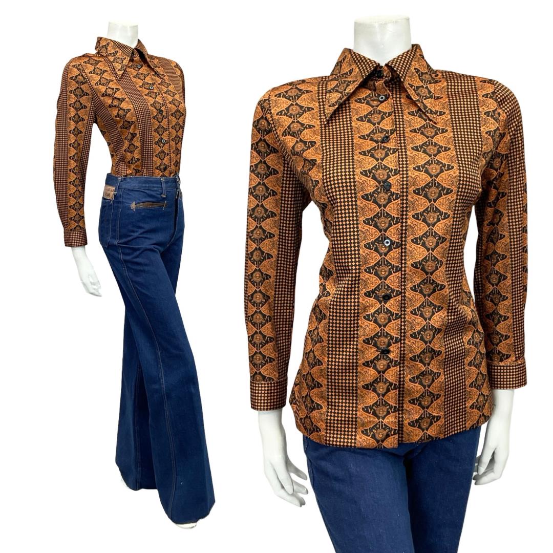 Shrinking Violets vintage brown and black Japanese art nouveau wavy print dagger collar shirt on a mannequin wearing blue flared jeans 