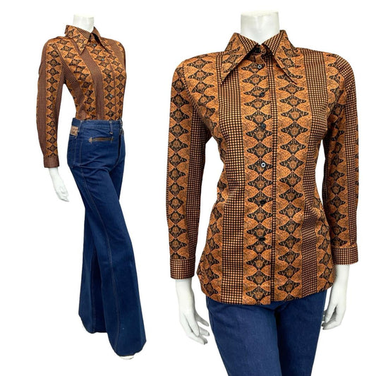 Shrinking Violets vintage brown and black Japanese art nouveau wavy print dagger collar shirt on a mannequin wearing blue flared jeans 