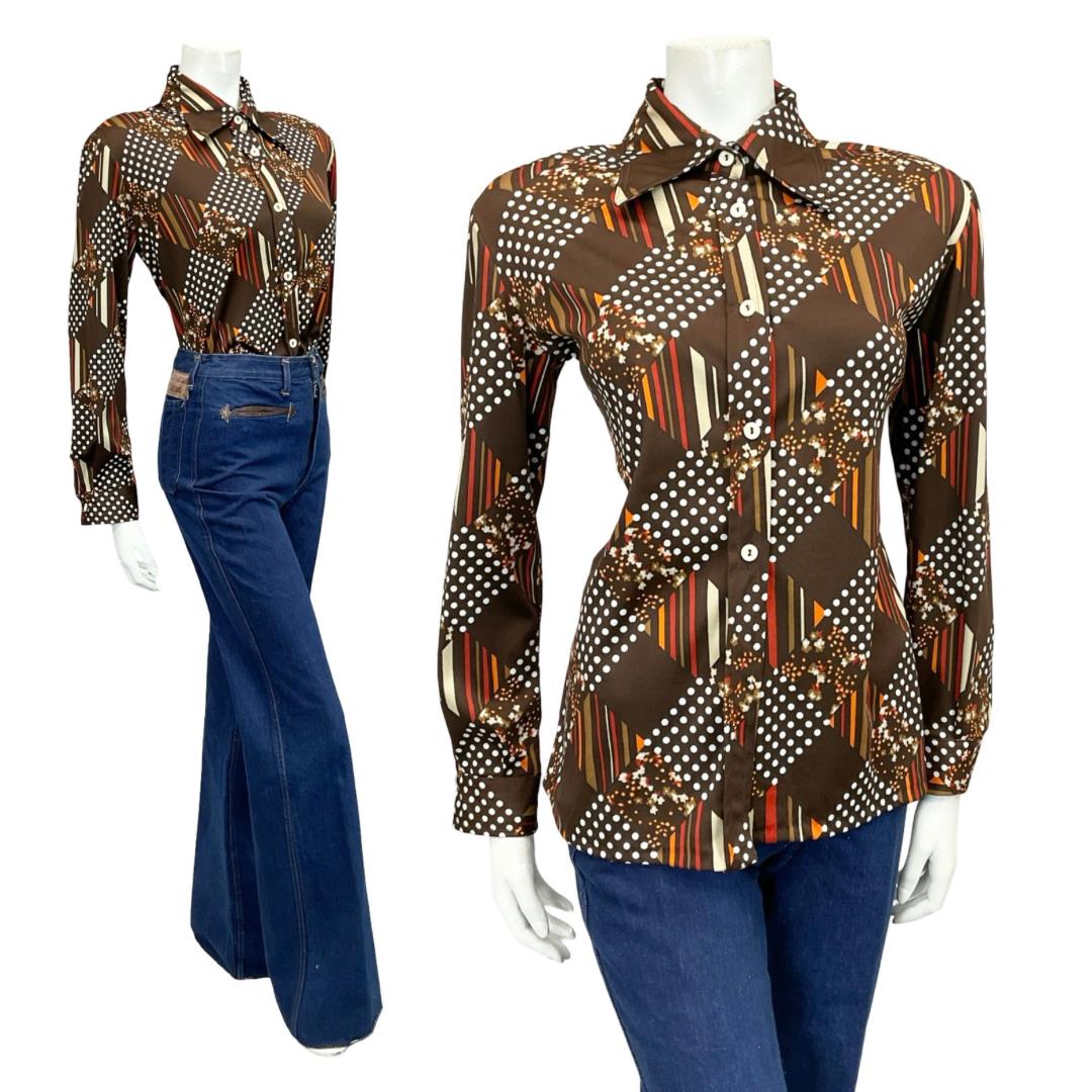 Mannequin wears a brown and white 60s 70s dotty grid geometric print dagger collar shirt with blue flared jeans 
