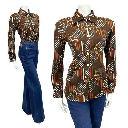 Mannequin wears a brown and white 60s 70s dotty grid geometric print dagger collar shirt with blue flared jeans 