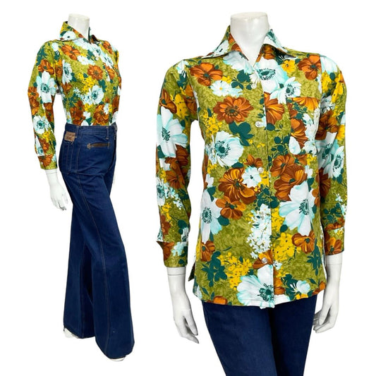 Mannequin wears a 60s 70s green, brown and white floral printed open dagger collar shirt shrinking violets vintage 