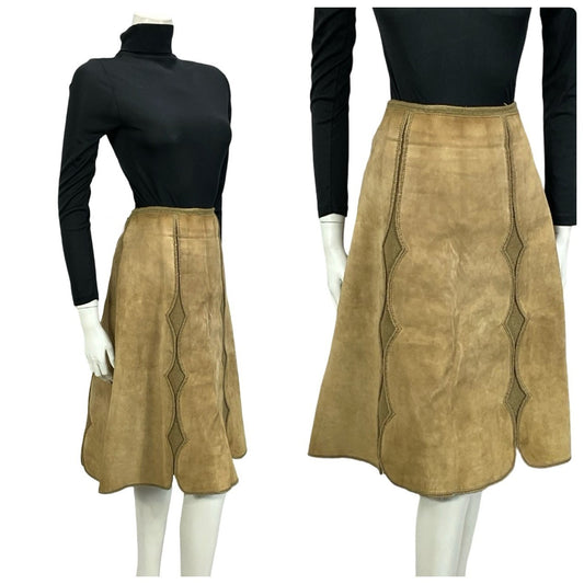 Shrinking Violets Vintage 60s 70s beige suede boho hippy crochet skirt on a white mannequin wearing a black turtleneck