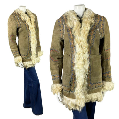 Shrinking Violets Vintage beige suede cream 60s 70s boho hippy embroidered shearling on a white mannequin wearing blue flared jeans 