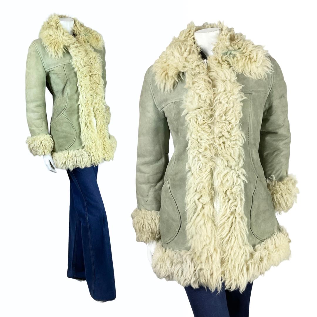 Shrinking Violets Vintage grey suede cream oho 60s 70s zip up shearling on a white mannequin wearing blue flared jeans 