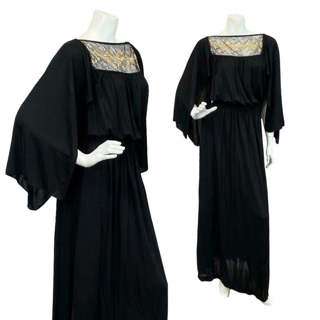 Vintage 60s 70s black floaty Grecian cape sleeve blouson maxi dress with gold mesh panelling on a white mannequin