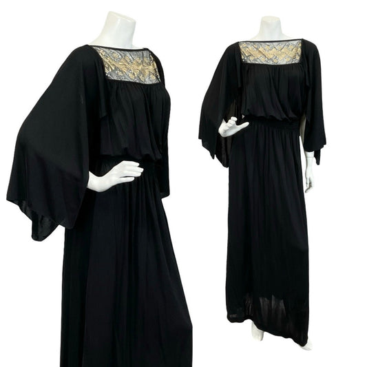 Vintage 60s 70s black floaty Grecian cape sleeve blouson maxi dress with gold mesh panelling on a white mannequin
