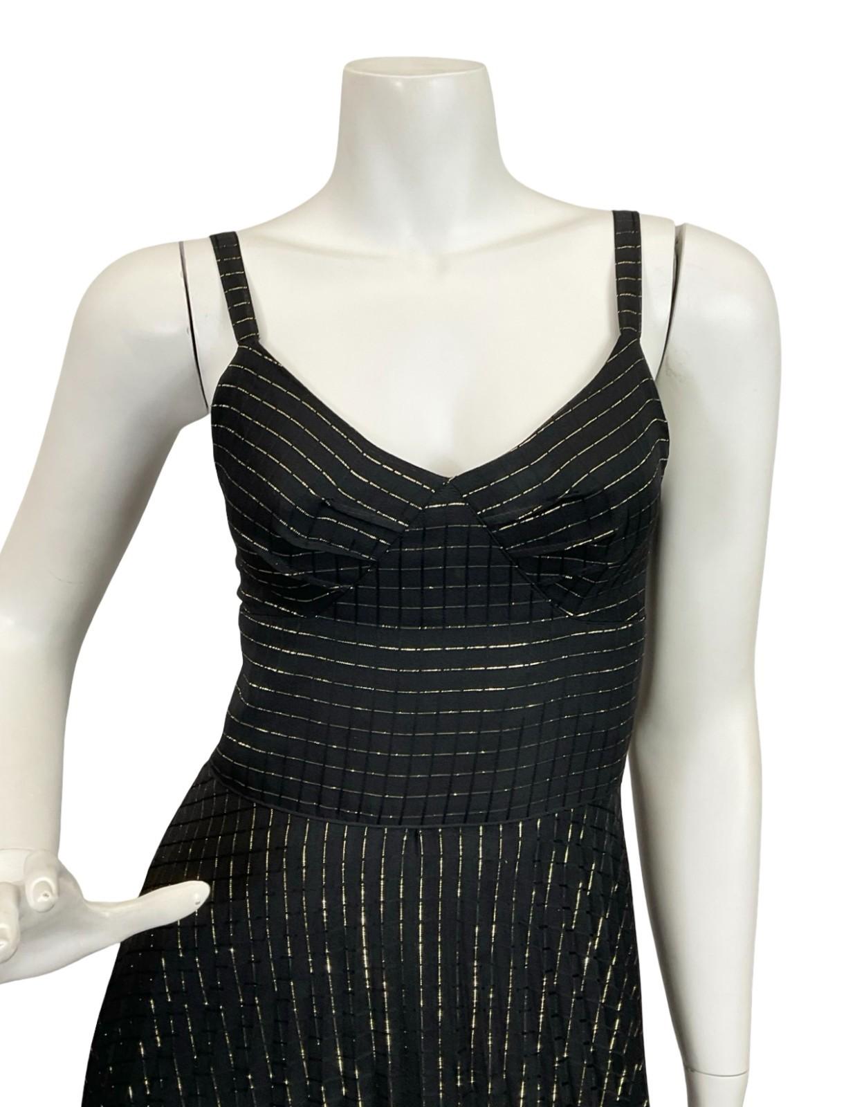 black and gold strappy striped maxi dress on a white mannequin 