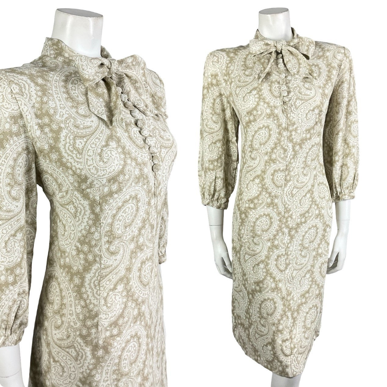 Mannequin wears a vintage 60s 70s beige and white psychedelic long sleeve pussybow shift dress.