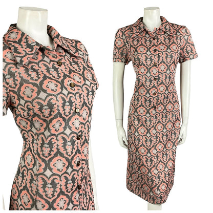 Mannequin wears a coral, grey and silver tile printed mod shirt dress. 