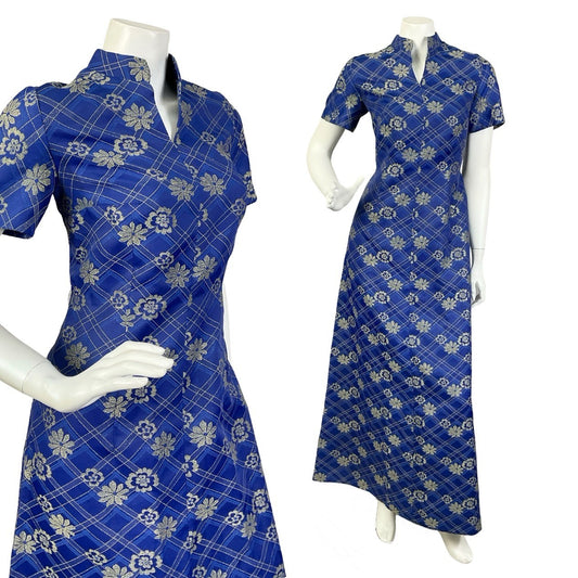 Mannequin wears a navy blue and gold floral mandarin collar maxi dress with short sleeves. 