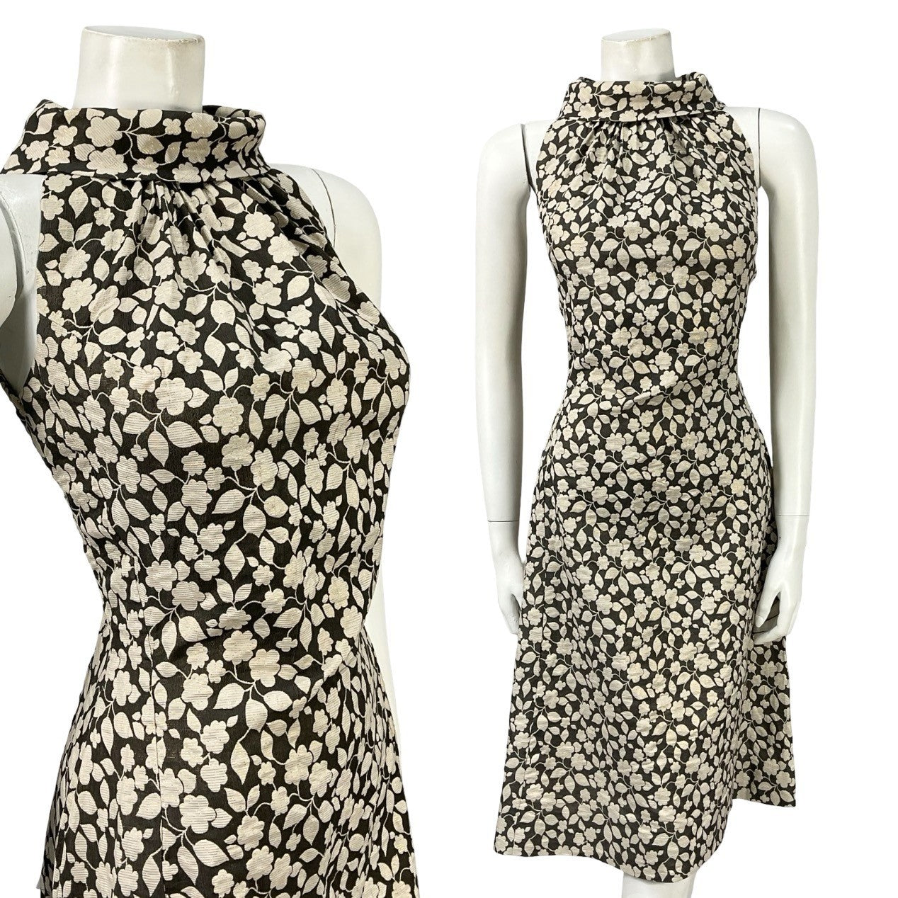 Mannequin wears a cream and black floral print halter funnel neck mini dress. 