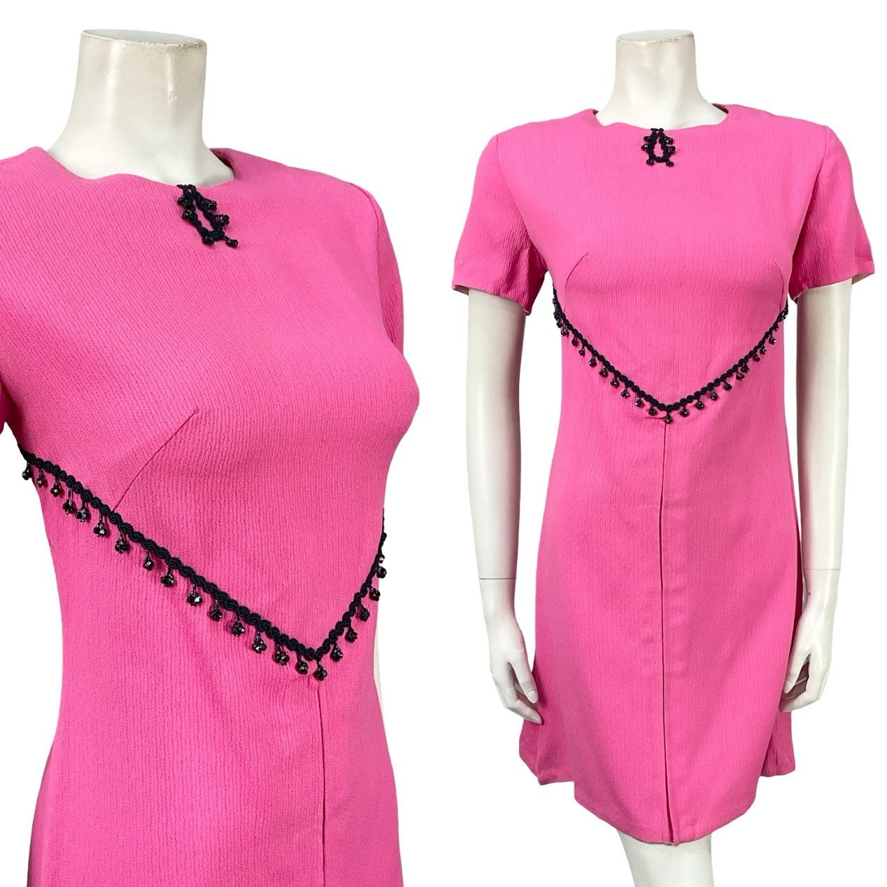 Mannequin wears a vintage 60s mod hot pink, short sleeved shift mini dress with a navy blue beaded trim. 