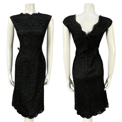 Mannequin wears a vintage 60s little black dress with a scallop trim plunge back and black lace. 