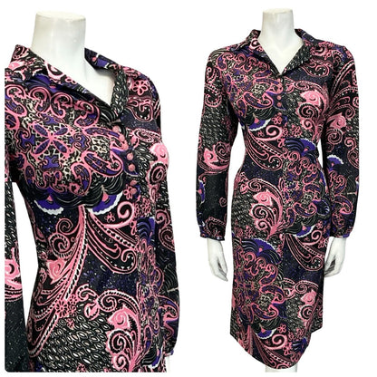 Mannequin wears a black and pink 60s 70s long sleeve psychedelic swirling print shirt dress. 