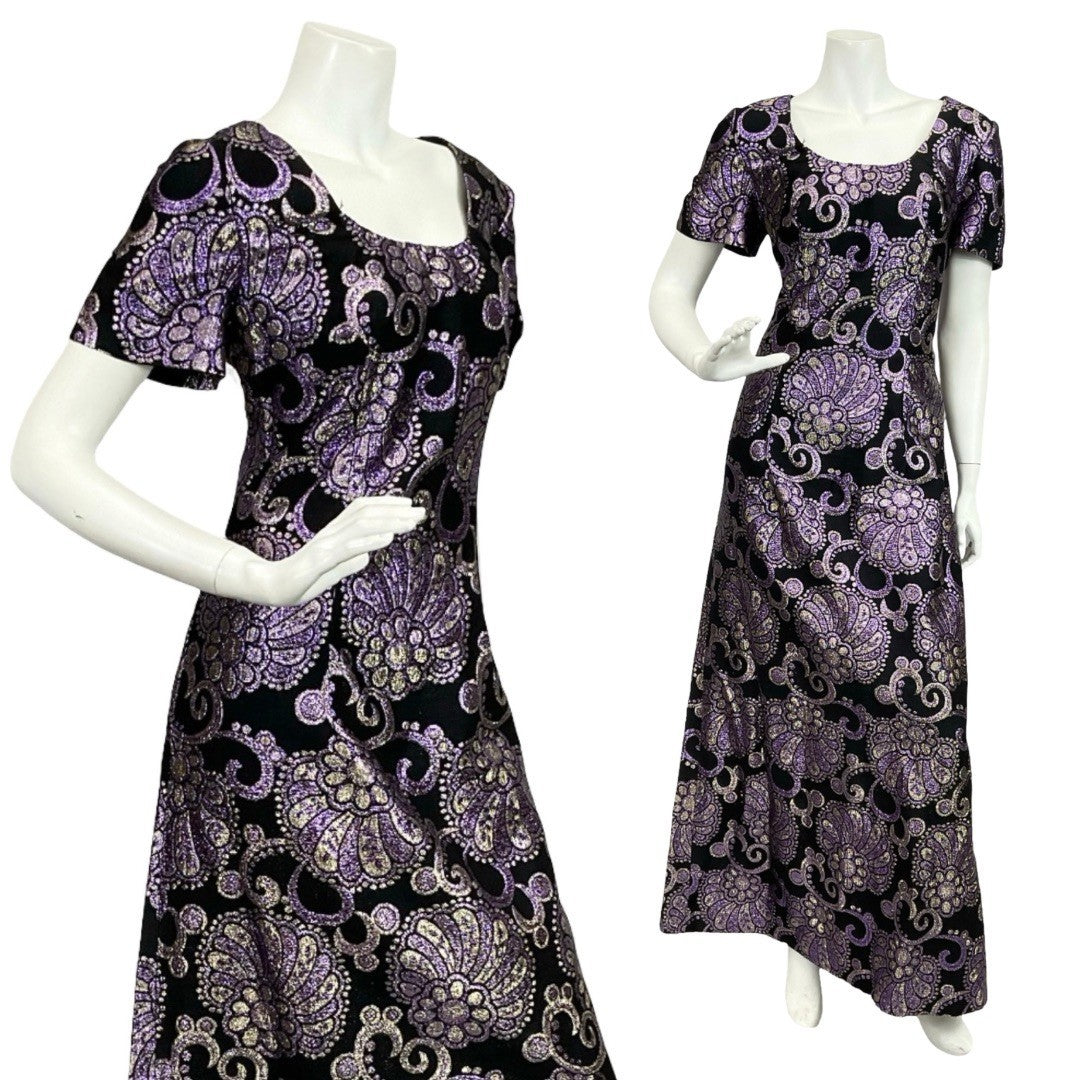 Mannequin wears a black and purple psychedelic glittery lurex short sleeve maxi dress. 