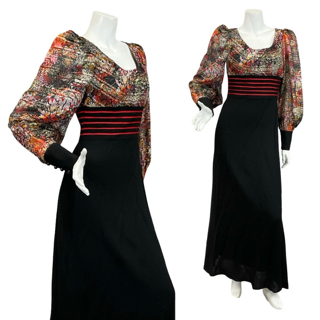 Mannequin wears a 60s 70s bishop sleeve black maxi dress with a glittery striped floral bodice. 