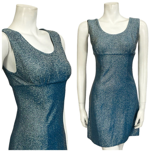 Mannequin wears a blue silver lurex glittery empire gogo mini party dress. 